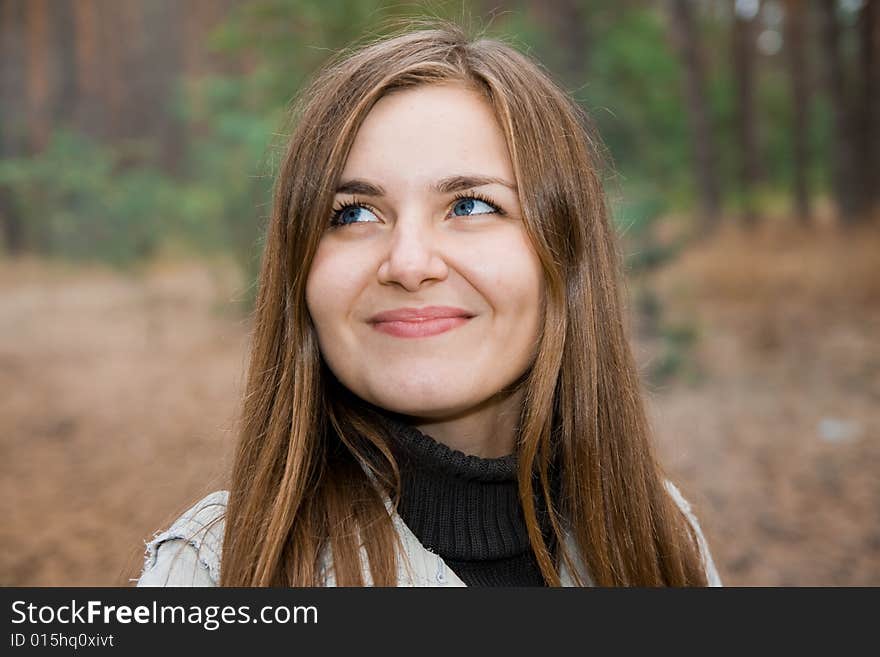 Beautiful girl looking aside outdoor