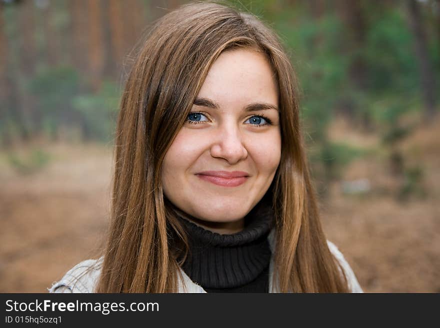 Beautiful girl looking aside outdoor