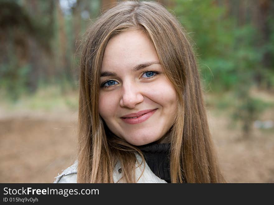 Beautiful girl looking aside outdoor