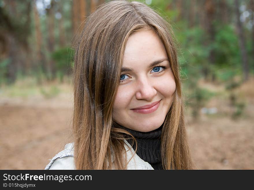 Beautiful girl looking aside outdoor