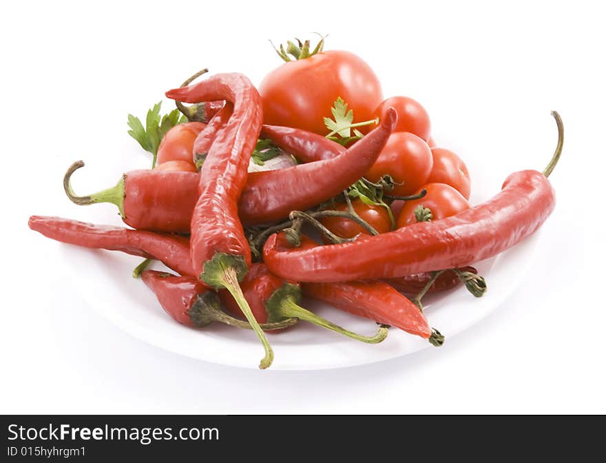 Red vegetables on white background