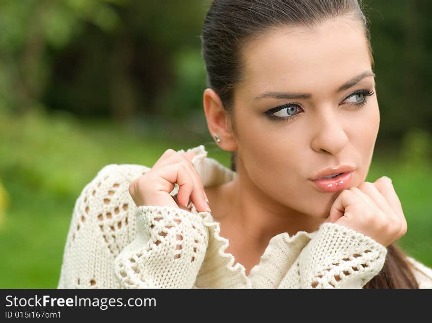 Portrait of beautiful woman in park