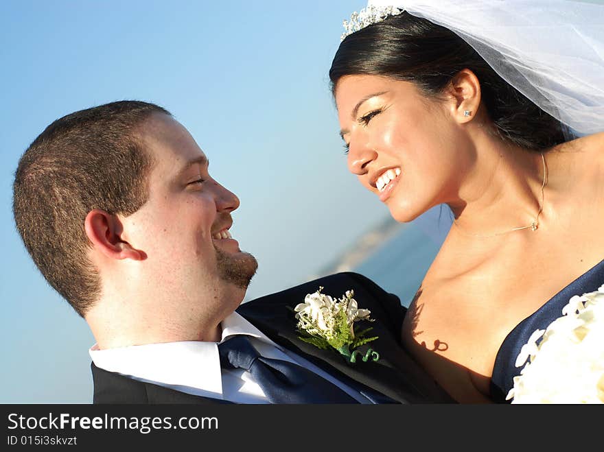 Excited, happy couple looking at each other adoringly. Excited, happy couple looking at each other adoringly