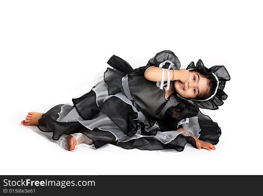 Cute little princess dressed in an old style english dress with a bonnet for halloween. Cute little princess dressed in an old style english dress with a bonnet for halloween