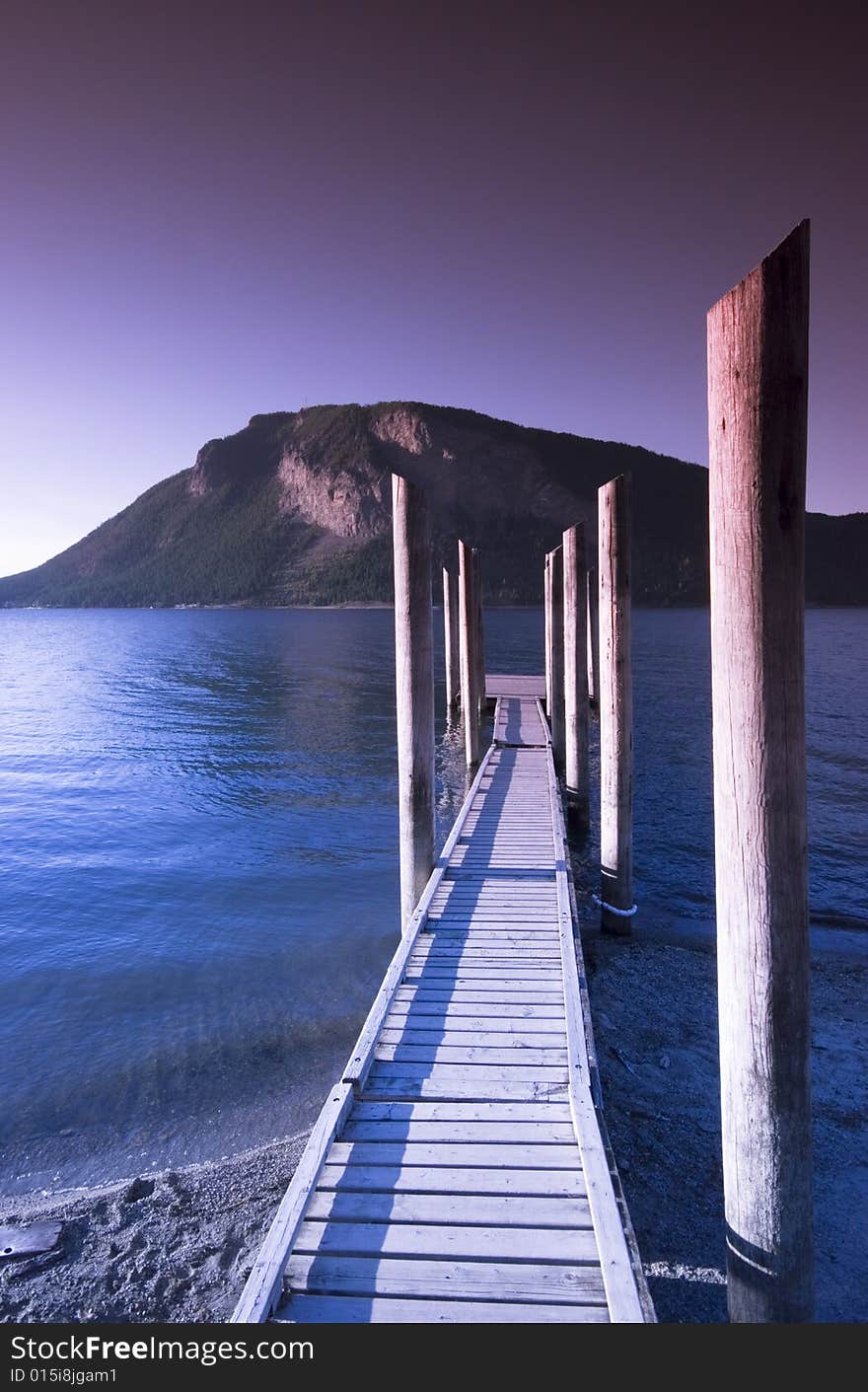 Sunset over Shuswap Lake boardwalk, Salmon Arm, British Columbia, Canada. Sunset over Shuswap Lake boardwalk, Salmon Arm, British Columbia, Canada.