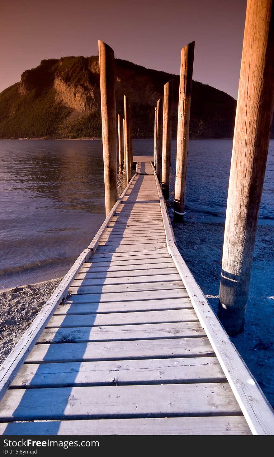 Sunset over Shuswap Lake boardwalk, Salmon Arm, British Columbia, Canada. Sunset over Shuswap Lake boardwalk, Salmon Arm, British Columbia, Canada.