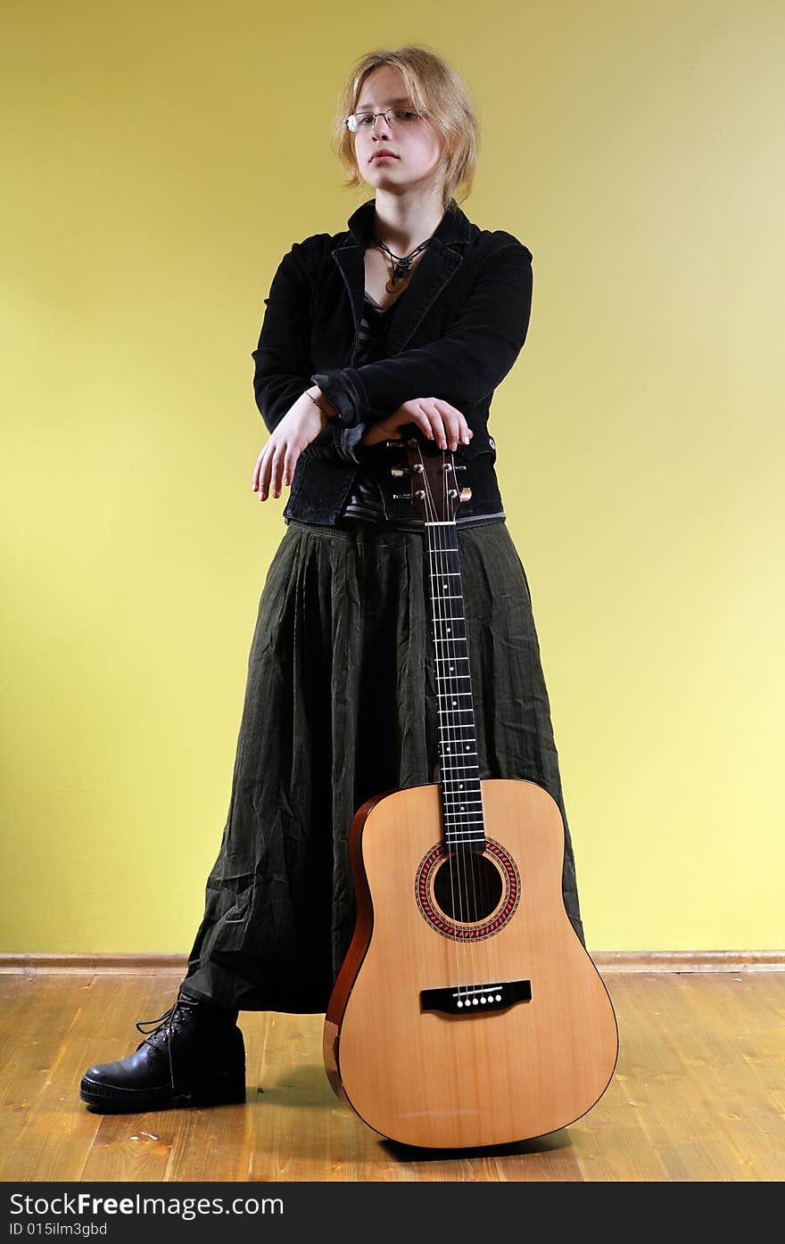 Young girl with acoustic guitar. Young girl with acoustic guitar