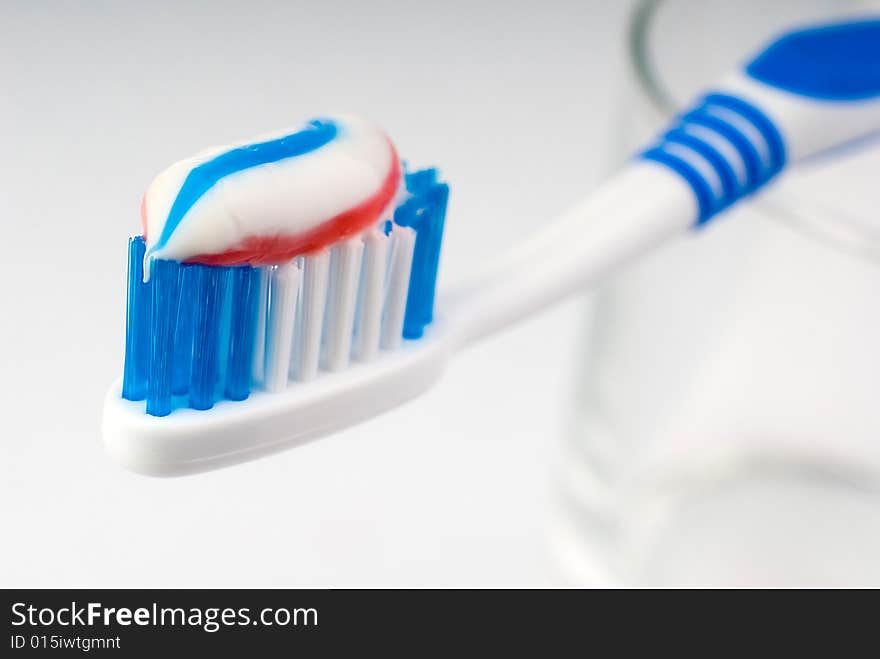 Toothbrush with toothpaste close-up