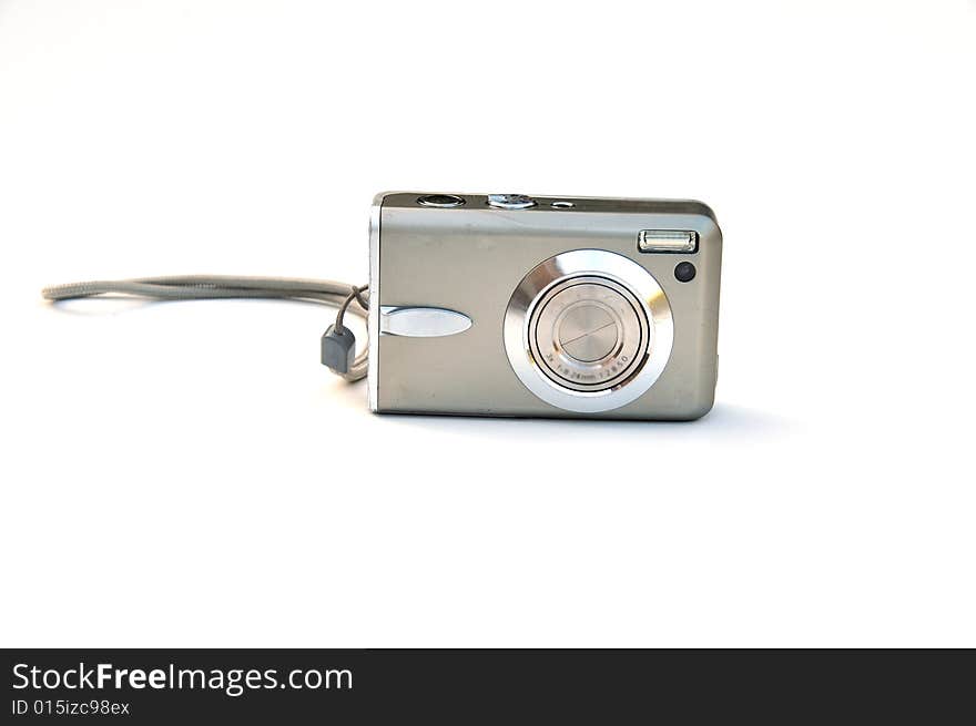 Shot of a silver camera on white