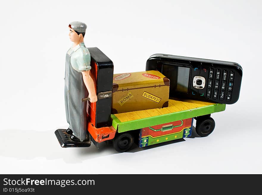 Old battery car toy with big packge and mobile phone