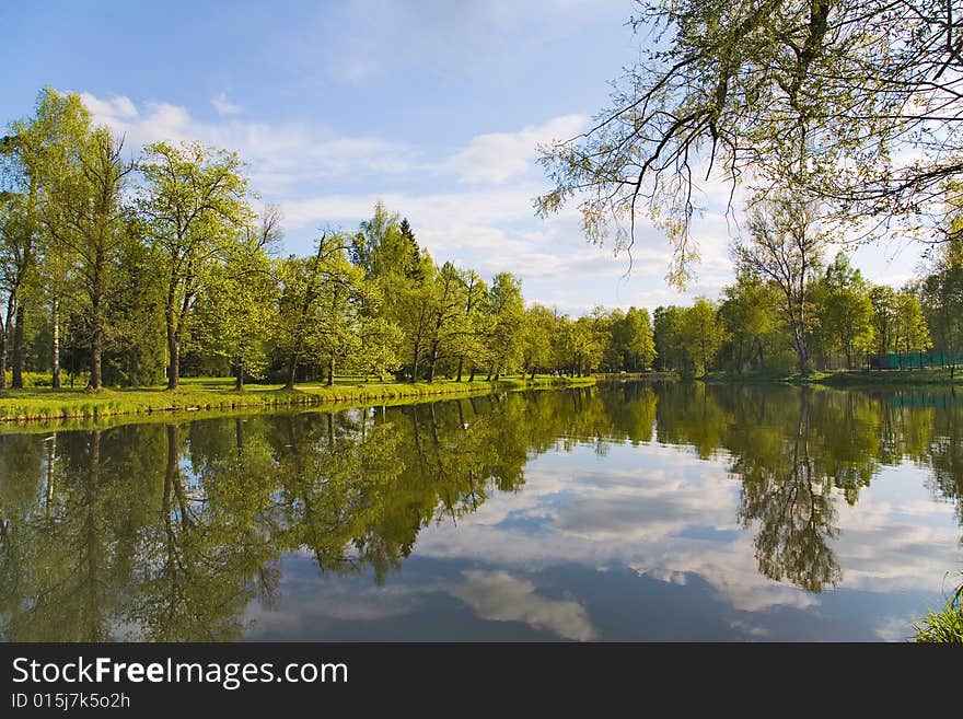 Landscape with blue sky, clouds, forest and lake. Landscape with blue sky, clouds, forest and lake