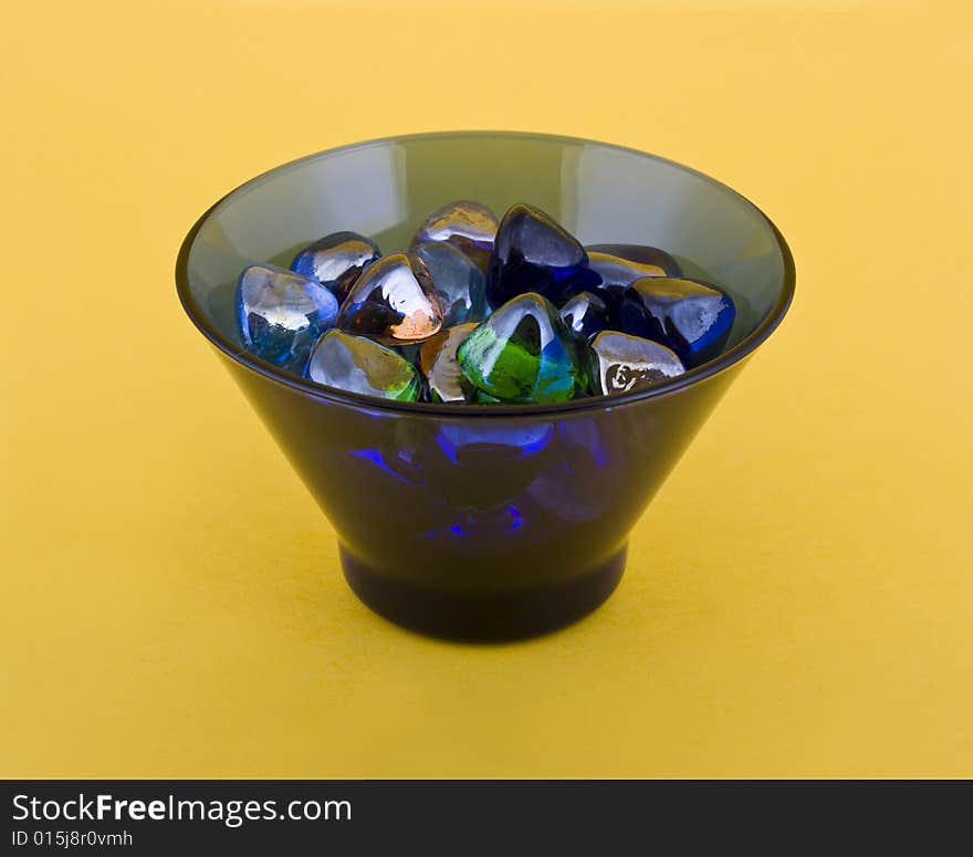 Glass bowl isolated on yellow background