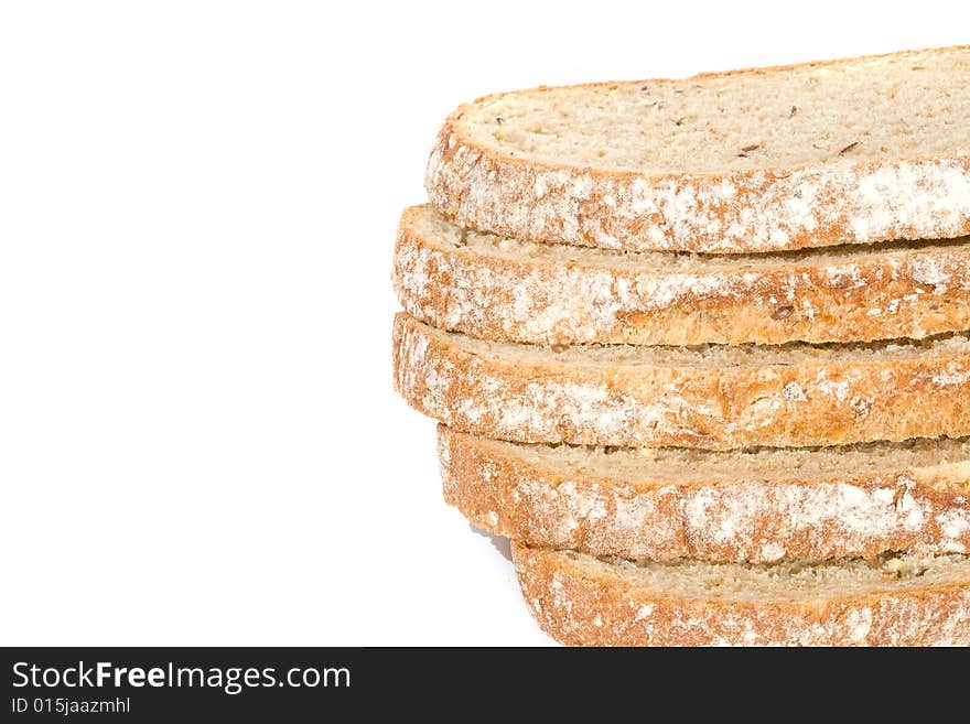 Slices of fresh wholegrain bread on white background