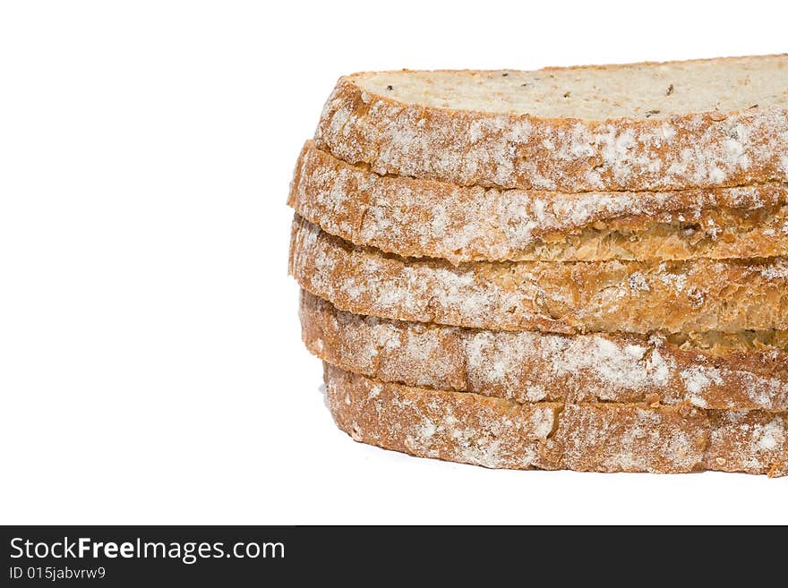 Slices of fresh wholegrain bread on white background