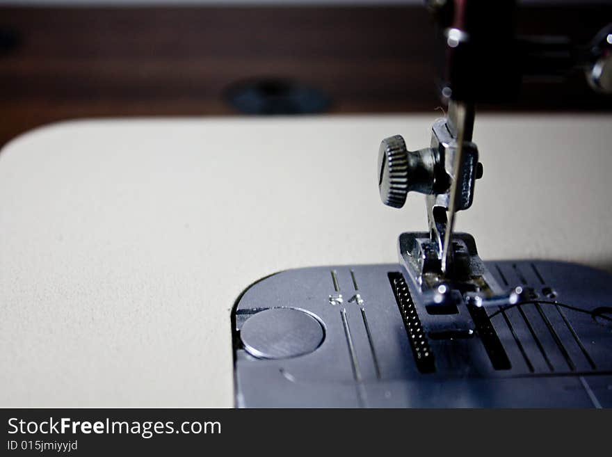 A close-up image of a sewing machine\\\'s needle. A close-up image of a sewing machine\\\'s needle.