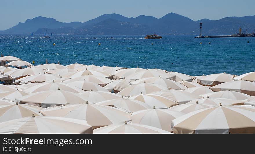 Parasols on the beach in Cannes (Croisette)