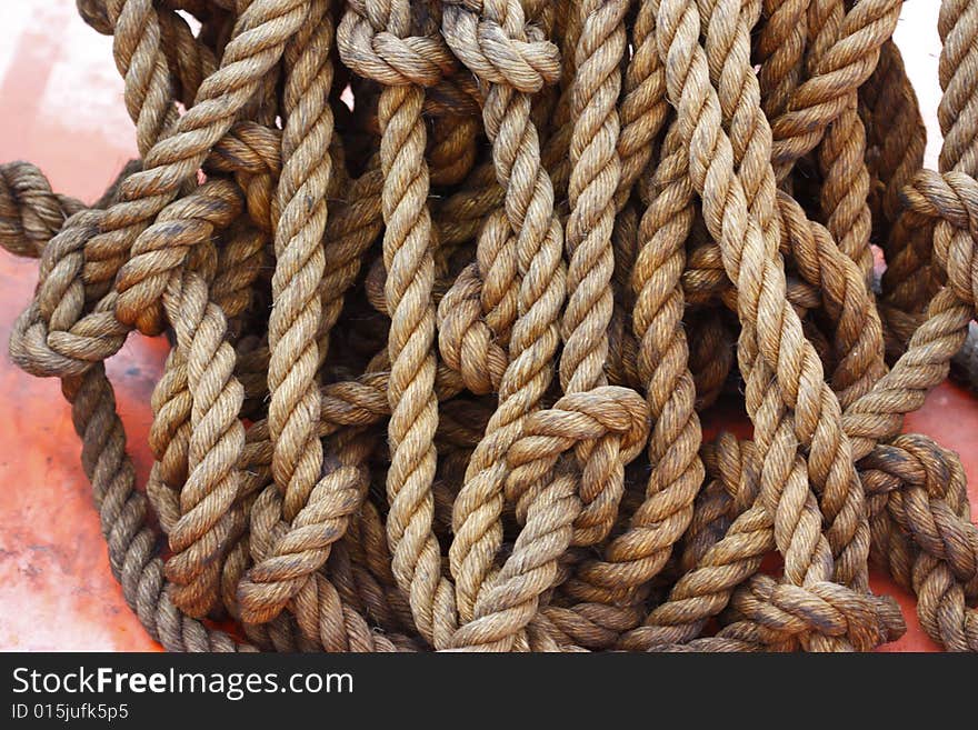 Sea rope on red boat