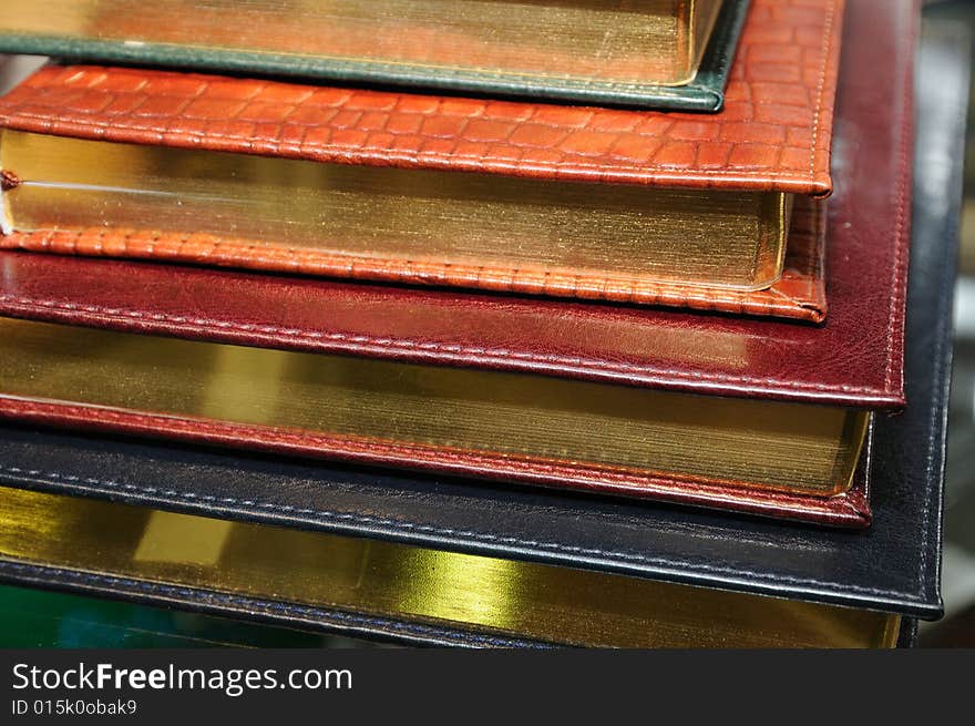 Stack of various organizers in a hard cover