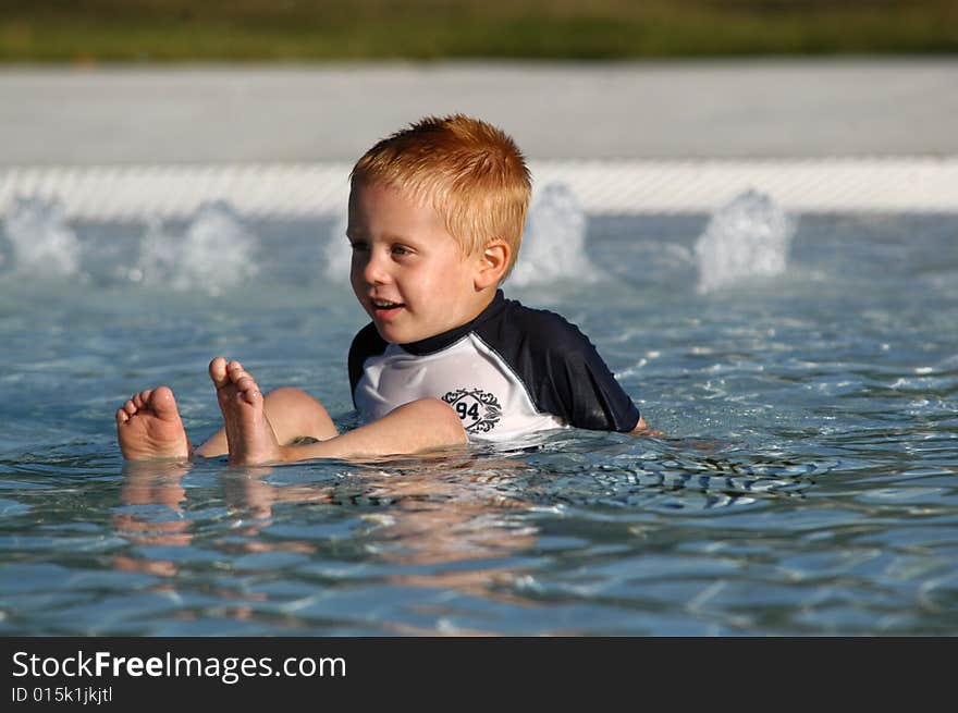 BOY IN POOL