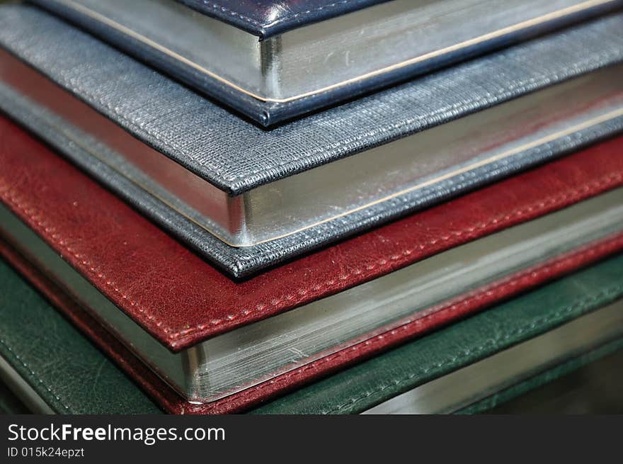 Stack of various organizers in a hard cover