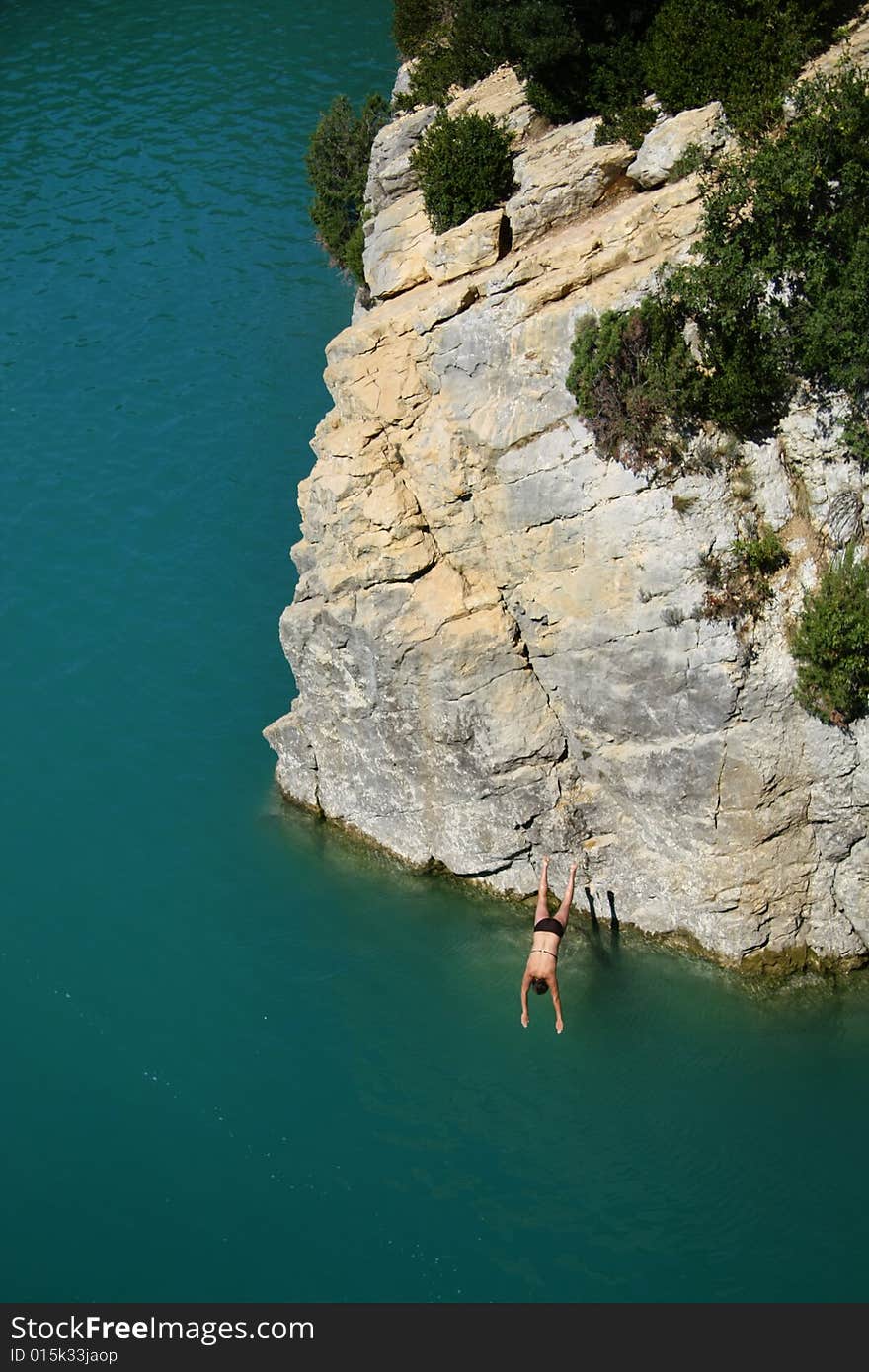 Woman jumps from the rock in Verdon