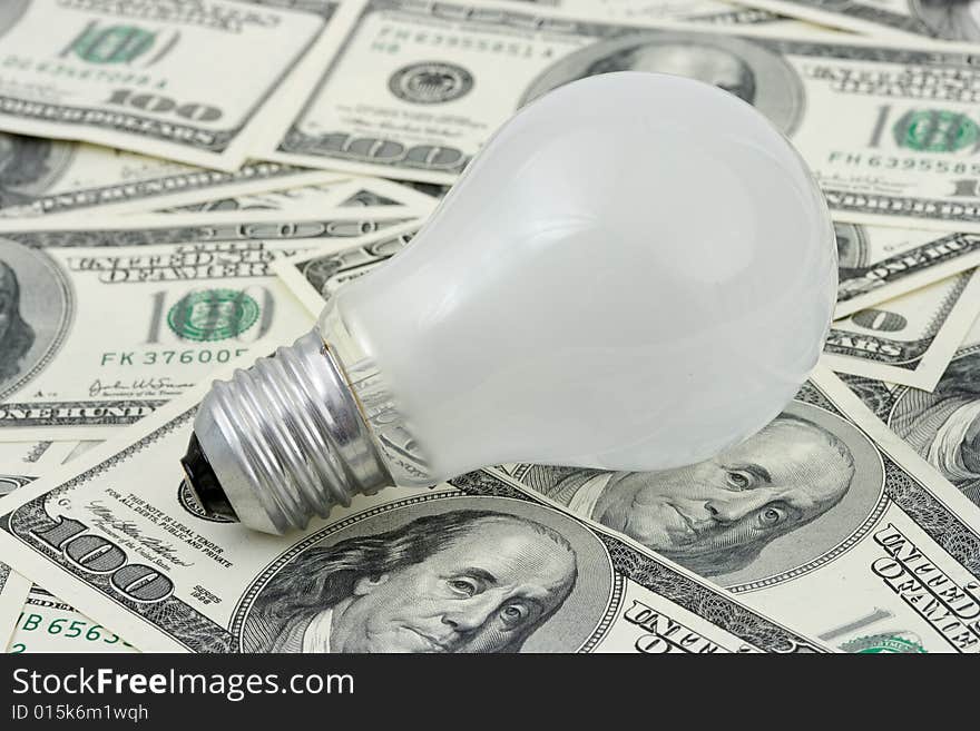 Lamp on money background