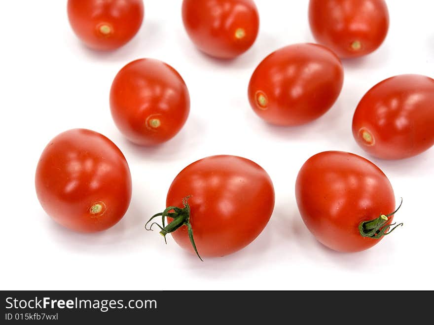 Many tomatoes on the vine