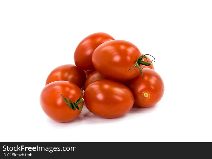 Many tomatoes on the vine