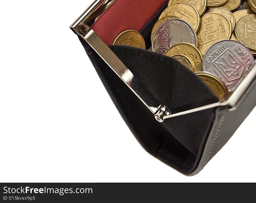 Purse and coins on a white background