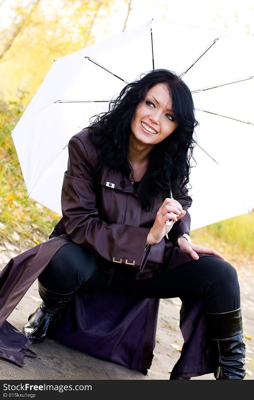 Beautiful woman with an umbrella