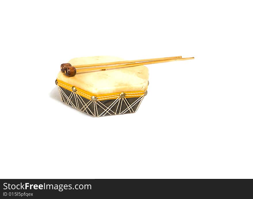 Drum with drumsticks isolated on the white background. Drum with drumsticks isolated on the white background