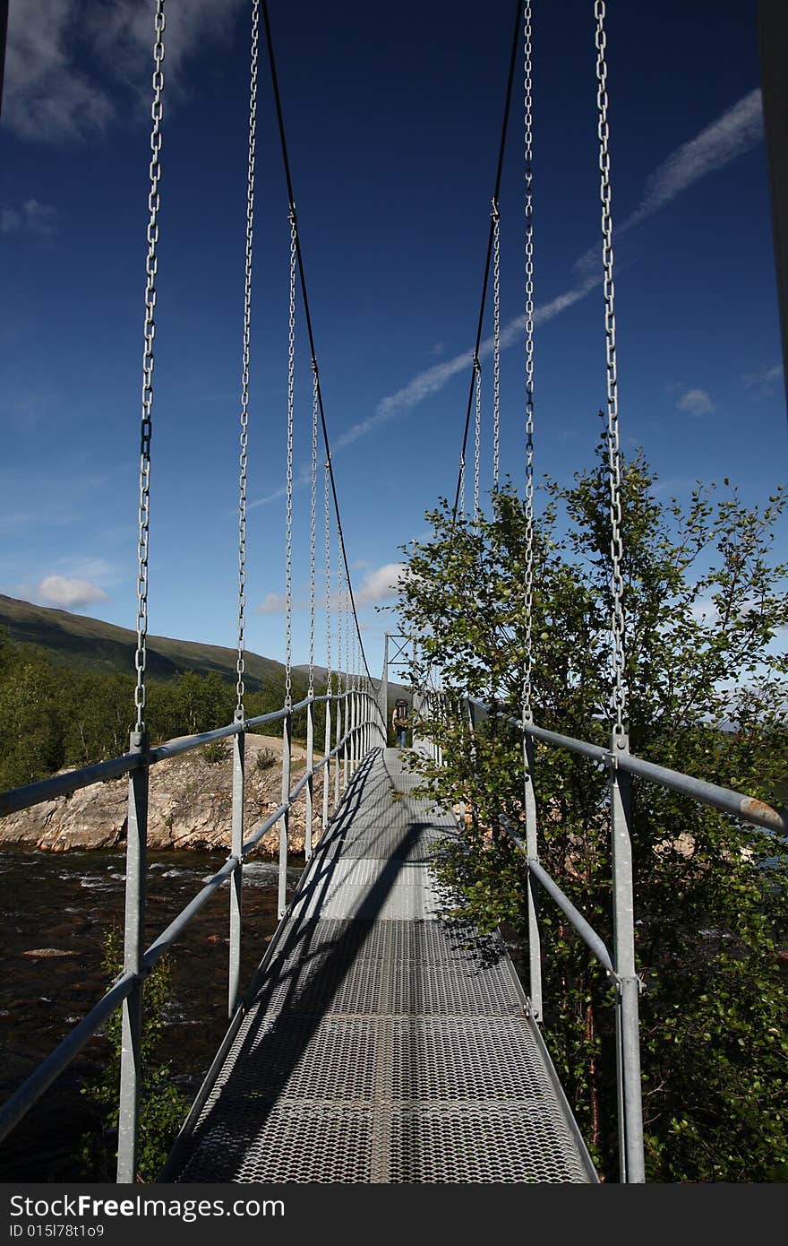 Suspended bridge in a national park, Sweden. Suspended bridge in a national park, Sweden