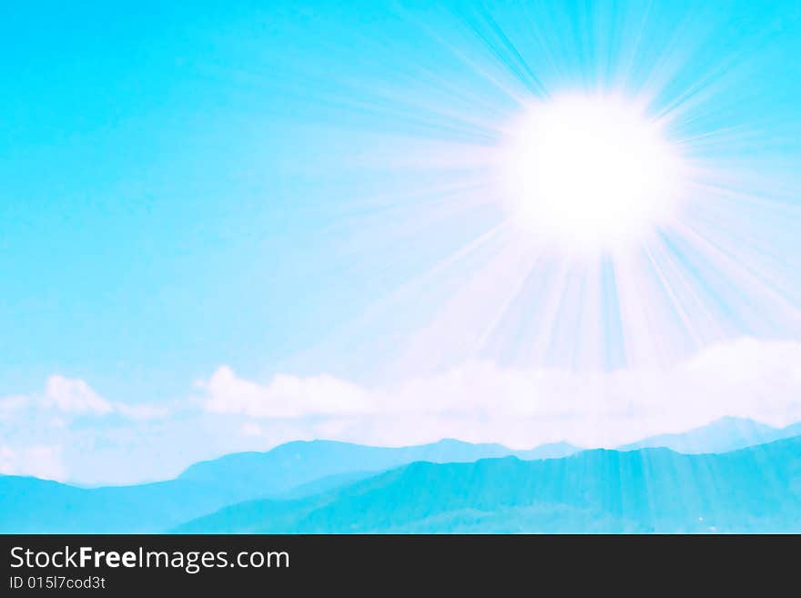 Bright sunbeams illuminate beautiful cloud on blue sky