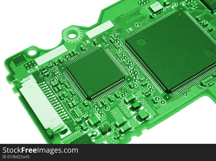 Computer board with chips colored in green style. Computer board with chips colored in green style