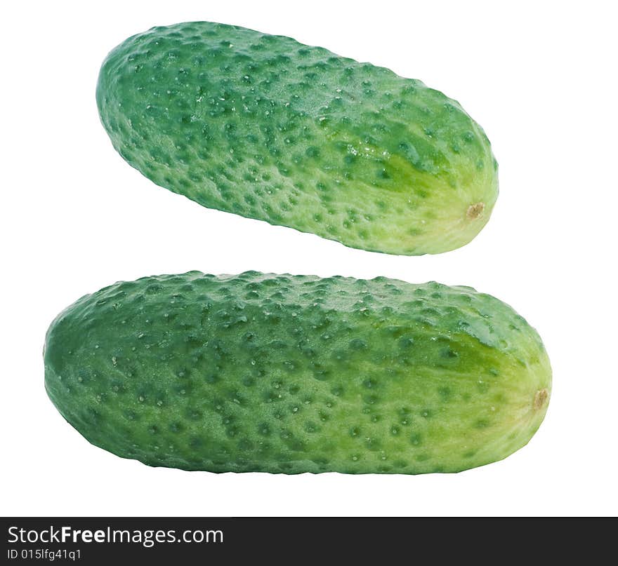 Fresh green cucumbers on white background