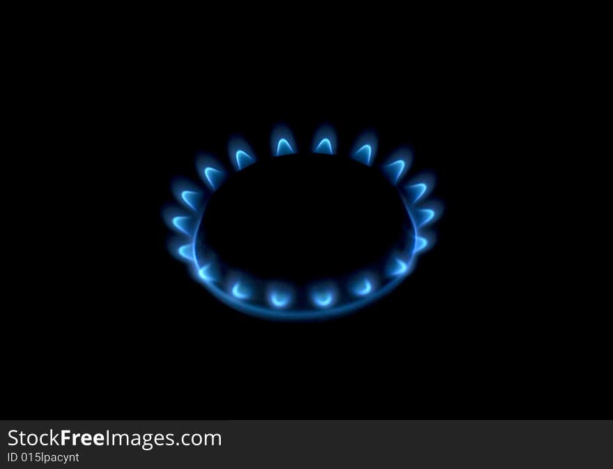 Flames of gas stove in the dark