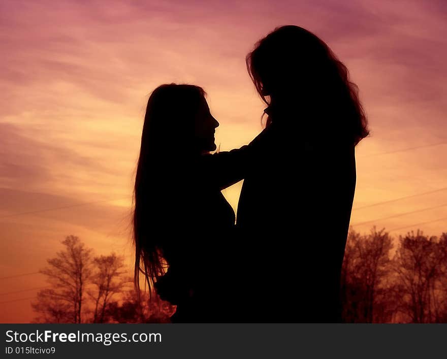 Romantic couple at sunset