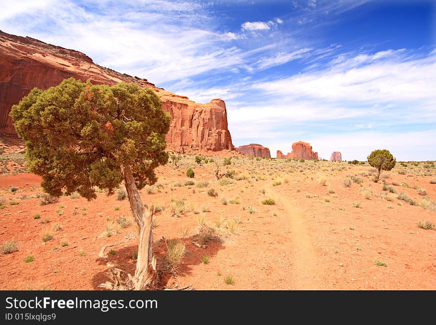 View of Monument Valley under a blue sky