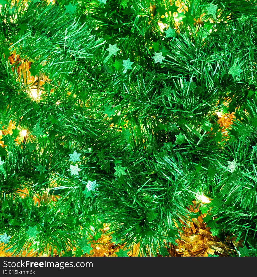 Christmas green and yellow tinsel with lights. Christmas green and yellow tinsel with lights