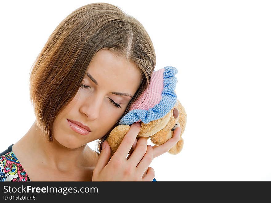 Young woman with her old toy on white. Young woman with her old toy on white