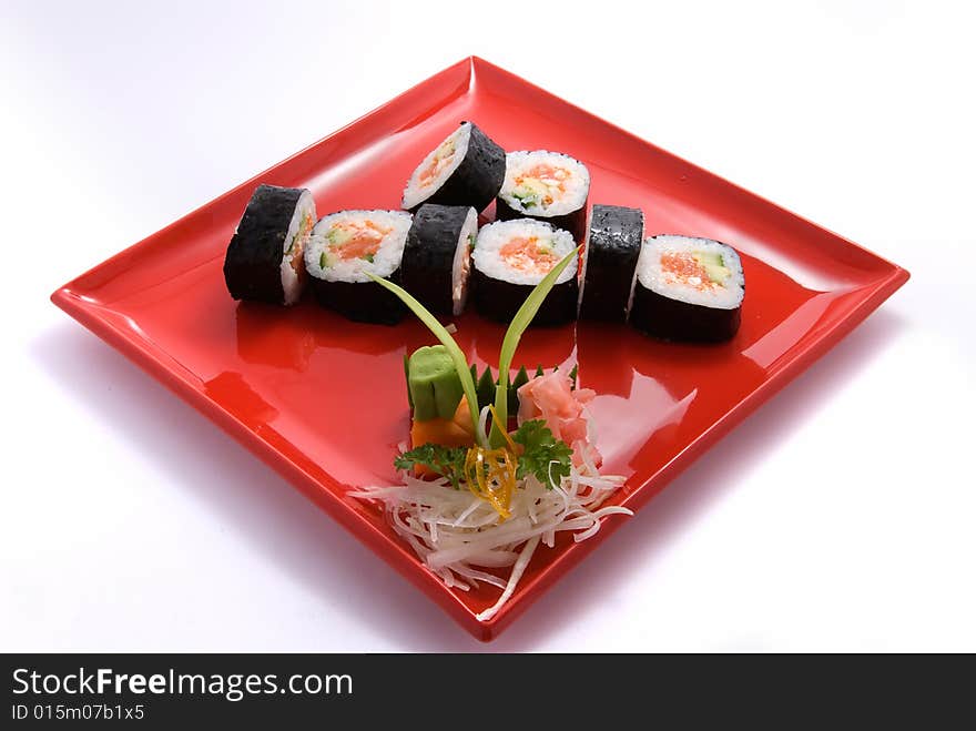 Rolls in red plate on white background. Rolls in red plate on white background