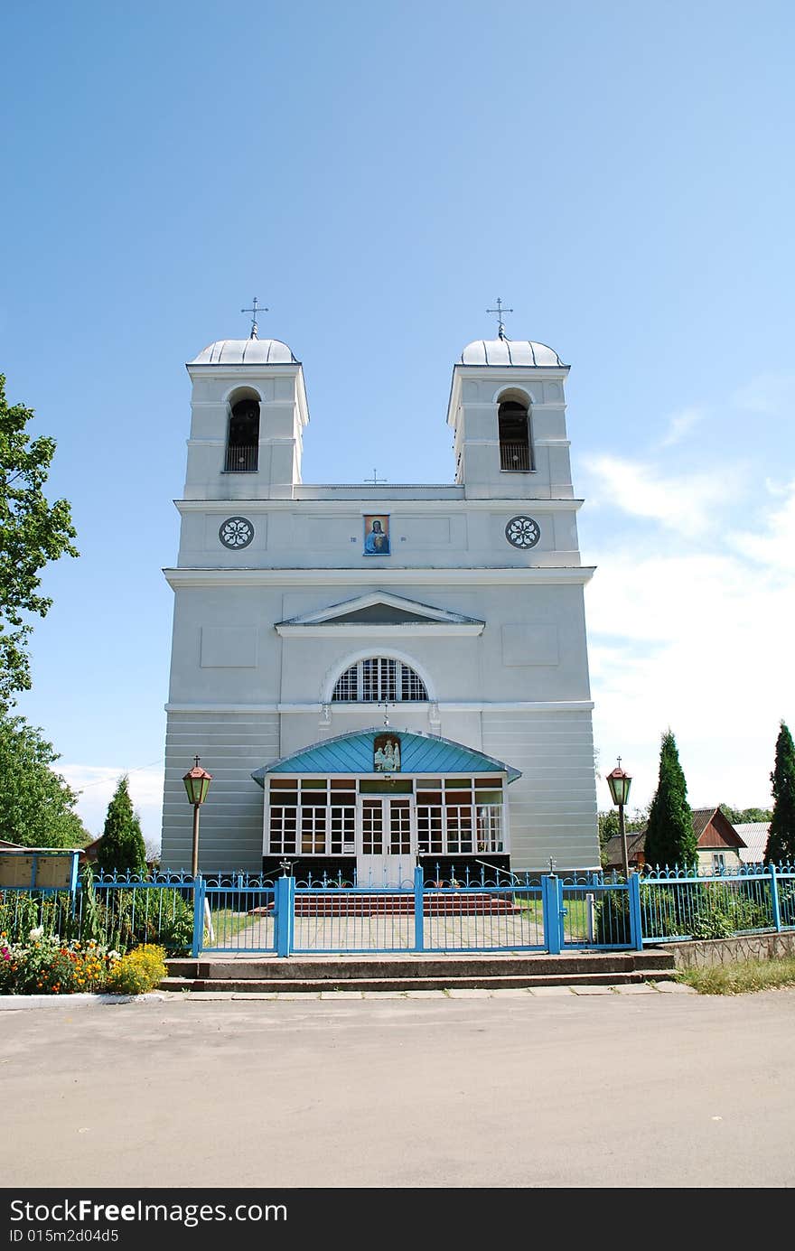 Old church on the blue sky