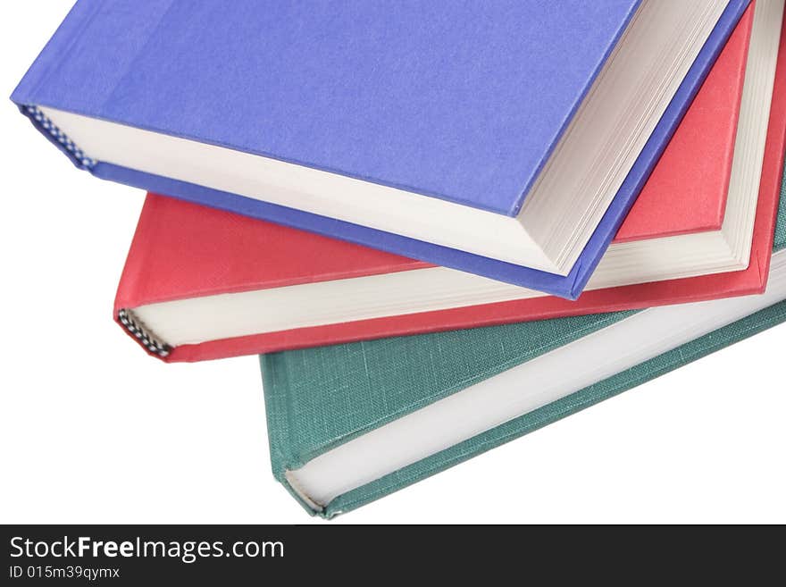 Stacked books on white background