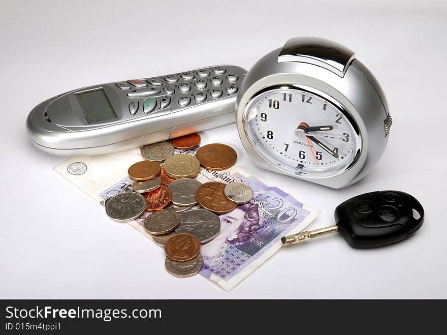 Items found on a bedside table on a white linen background.