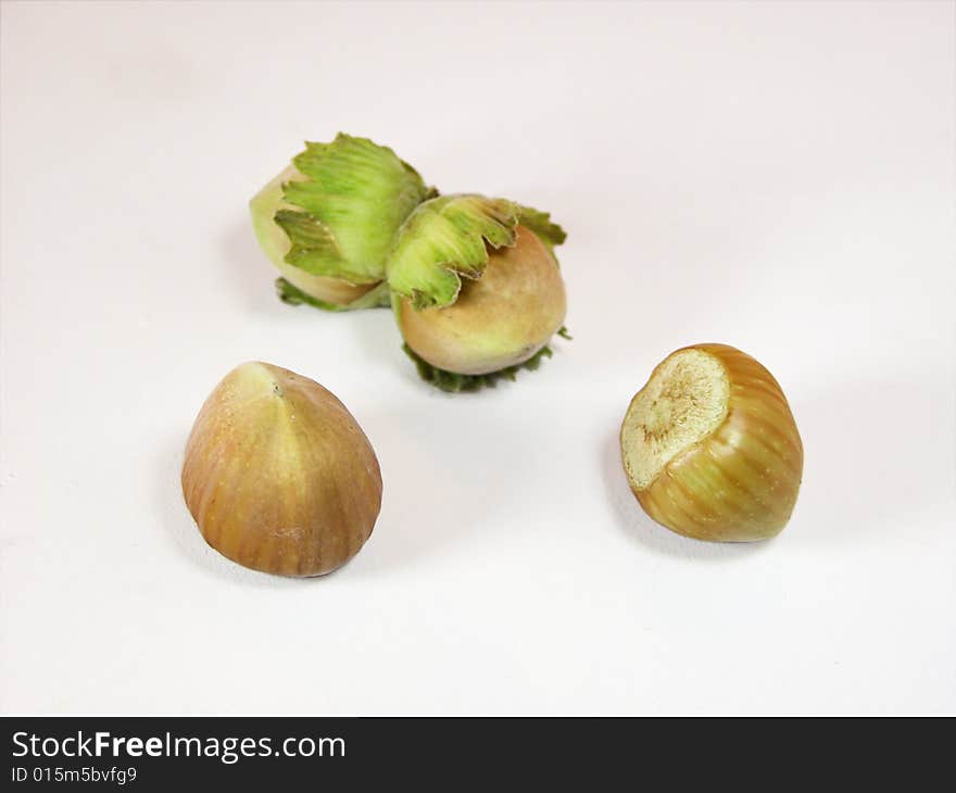 The hazelnuts - isolated on white