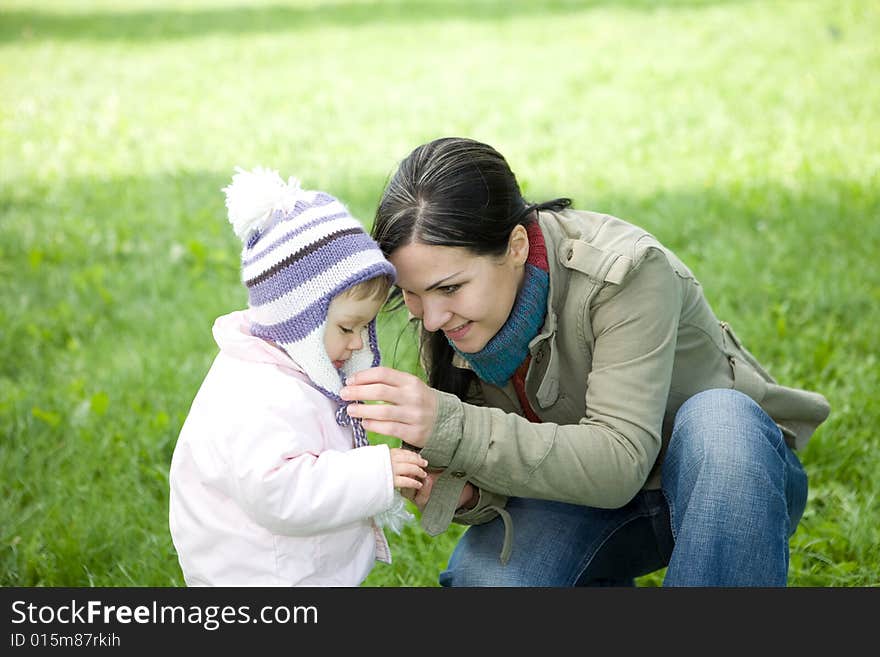 Happy family playing in park. Happy family playing in park