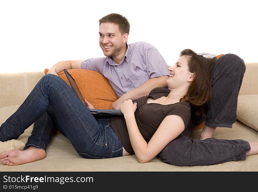 Casual couple together on sofa. Casual couple together on sofa