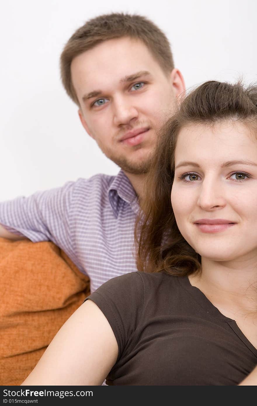 Casual couple together on sofa. Casual couple together on sofa