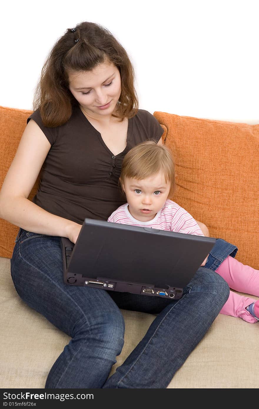 Happy family sitting on sofa with laptop. Happy family sitting on sofa with laptop