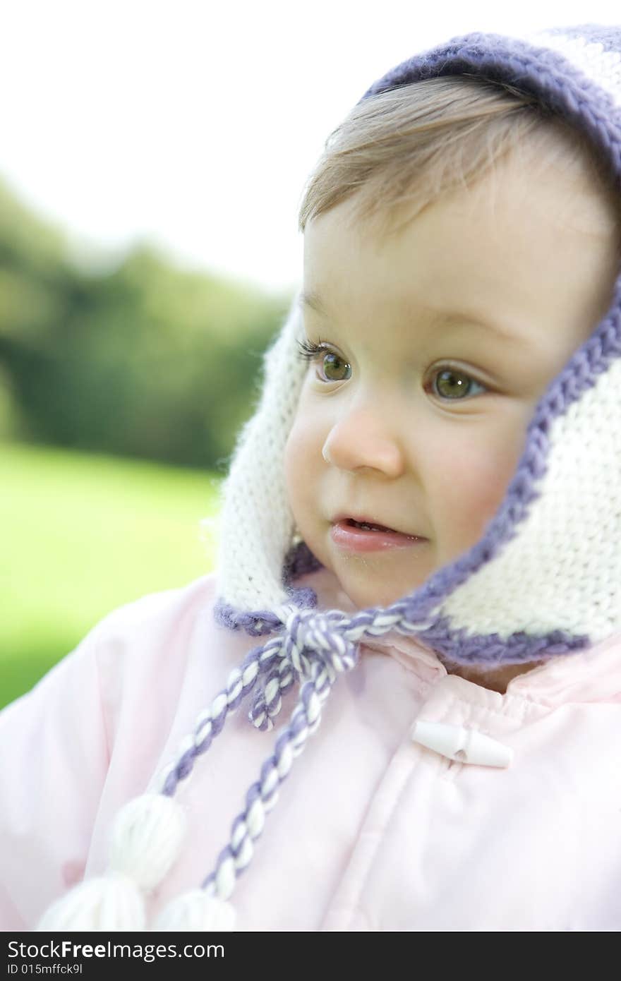 Portrait of sweet baby girl in park. Portrait of sweet baby girl in park